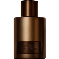 Dark bronze Tom Ford Oud Minerale Eau de Parfum bottle, cylindrical with a round cap, 100 ml size.