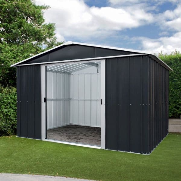 10' x 13' Yardmaster Castleton shed in anthracite metal, featuring a sloped roof, double doors, and a spacious interior, set against a green lawn and cloudy sky.