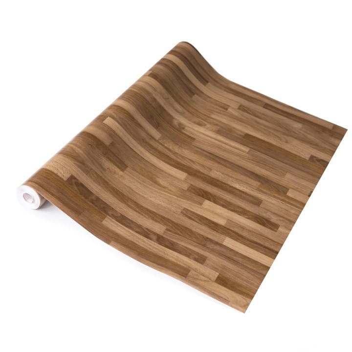 Self-adhesive vinyl wrap in a walnut block design featuring a rich brown color with a wood grain texture, rolled out for easy application.