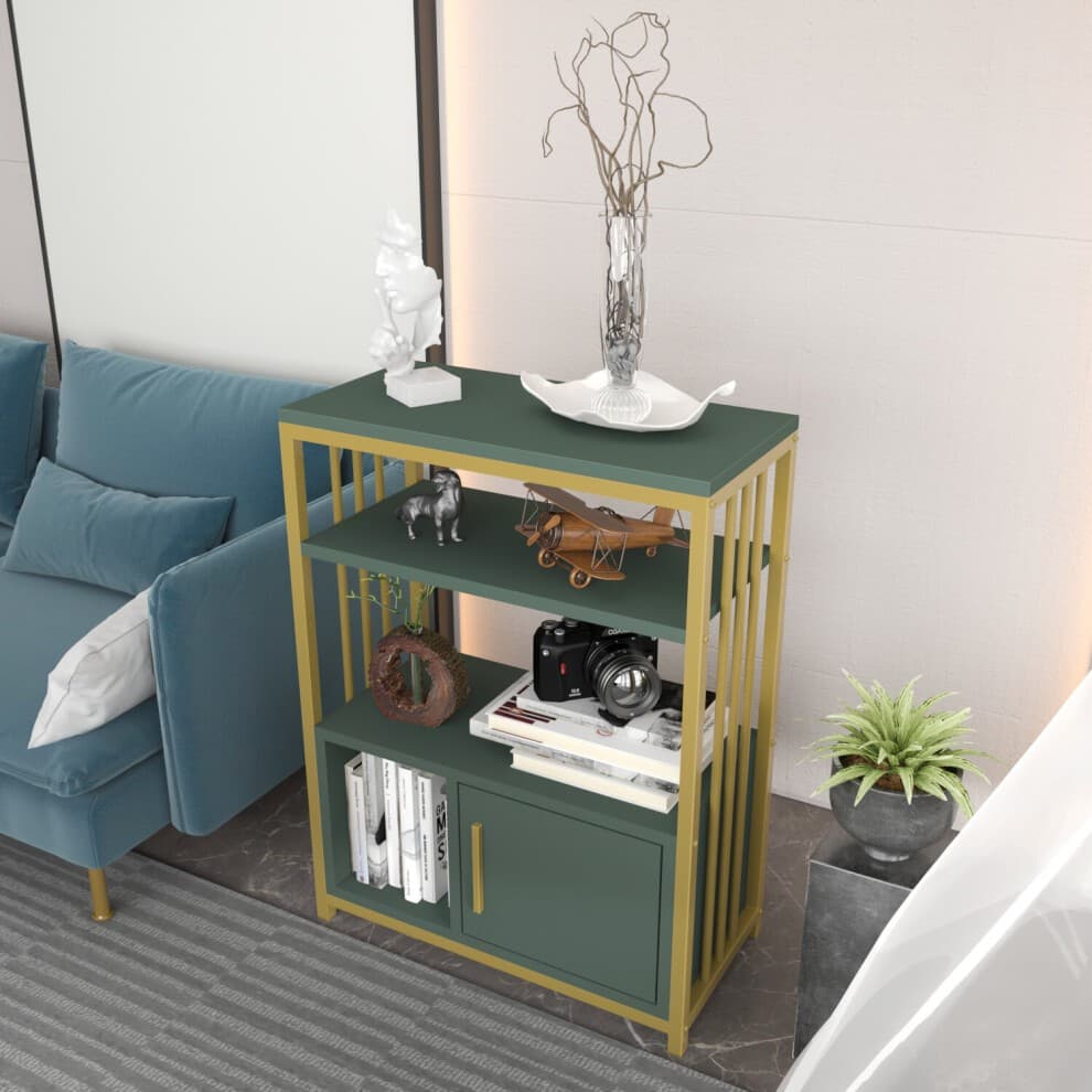 Green and gold shelving unit featuring three open shelves and one cabinet, with decorative items like a vase, a small statue, and books displayed on the shelves.