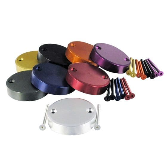 Silver 42mm Pro-Bolt Aluminium Reservoir Cap surrounded by various colored caps, showcasing a sleek design and accompanied by colorful screws.