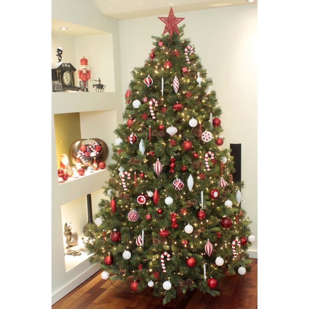 A beautifully decorated 6ft Christmas tree adorned with red and gold baubles, candy cane ornaments, and white accents, showcasing a festive holiday theme.