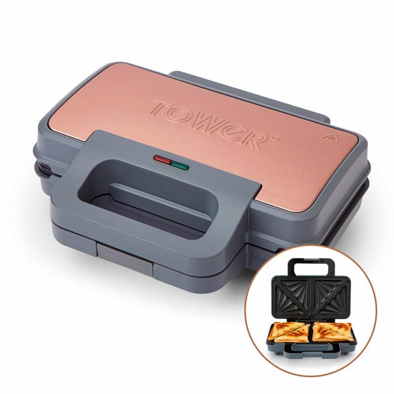 Grey Tower Cavaletto 900W sandwich maker with a copper-colored lid, featuring a handle, indicator lights, and a non-stick interior for easy cooking and cleaning.