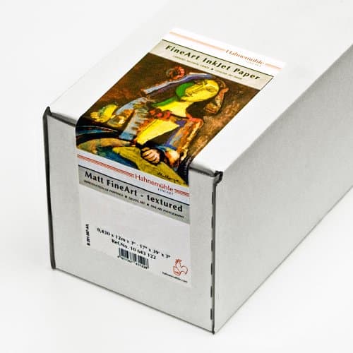 White box containing Hahnemühle Albrecht Dürer FineArt paper, featuring a colorful label with an artwork image, indicating 210gsm weight and textured finish.