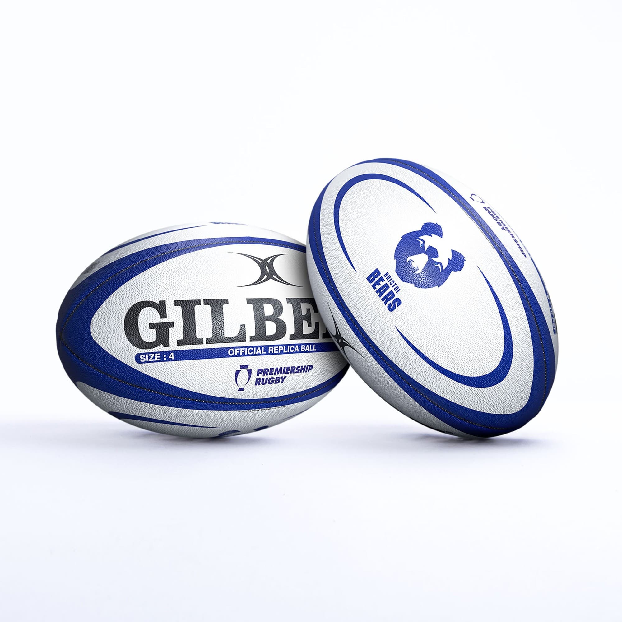 Gilbert Bristol Bears replica rugby ball in white and blue, featuring the Bristol Bears logo, "Gilbert" branding, and "Official Replica Ball" text. Size 4.