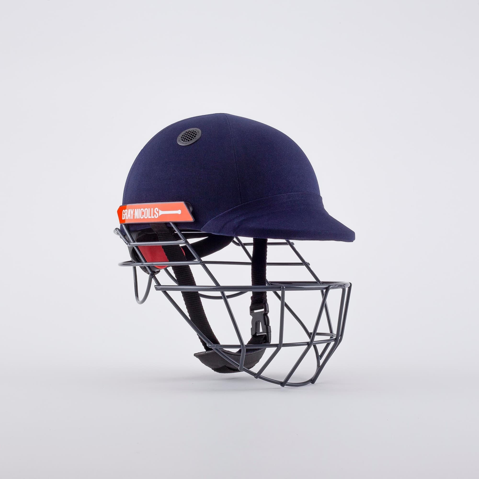 Gray-Nicolls Atomic 360 cricket helmet in navy with a sturdy black metal grille, adjustable chin strap, and bright orange branding on the front.