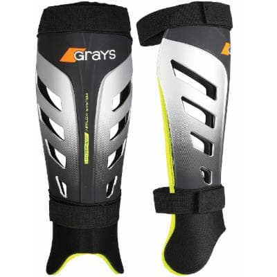 Black and gray Grays G800 shinguards featuring a sleek design, ventilation slots, and adjustable straps for a secure fit, highlighted with a vibrant yellow trim.