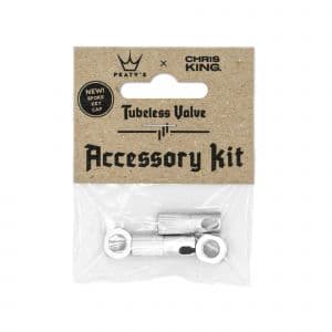 Peaty's Chris King (MK2) Tubeless Valves Accessory Kit in a clear package, featuring silver aluminum valve caps and a sport cap, with a brown cardboard backing displaying product details.