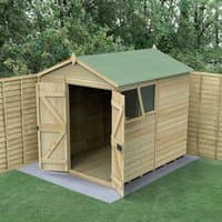 Wooden apex shed with double doors, green roof, and window, set on concrete slab in garden setting.