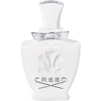 White Creed Love in White perfume bottle with embossed logo and silver bow, 75 ml, floral fragrance for women.