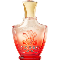 Red gradient glass bottle of Creed Royal Princess Oud Eau de Parfum with gold cap and embossed logo.