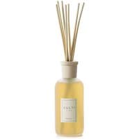 Culti Fuoco Stile diffuser, 250 ml amber liquid in clear glass bottle with wooden reeds and white label.