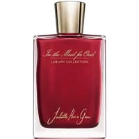 Red rectangular perfume bottle with gold cap, labeled "In the Mood for Oud" by Juliette has a Gun, 75 ml.