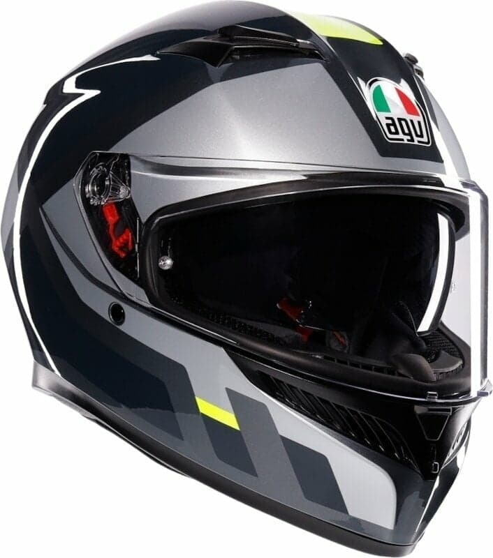 AGV K3 Shade 22.06 helmet in grey with black and yellow accents, featuring a sleek aerodynamic design, a tinted visor, and ventilation ports, size S for men.