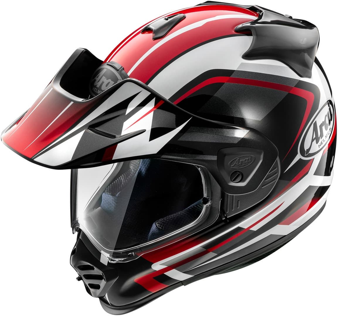 Arai Tour-X5 Discovery adventure helmet in black, white, and red, featuring a sleek aerodynamic design, a clear visor, and a removable peak for versatility.
