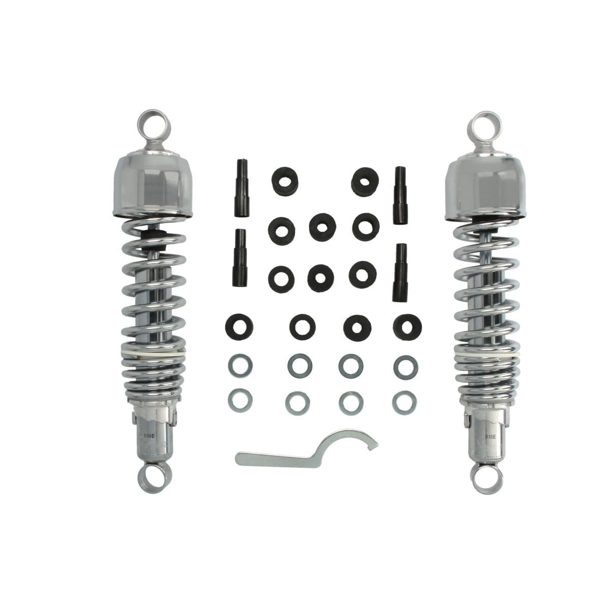 Chrome twin shock absorbers with a 325 mm eye-to-eye measurement, featuring coiled springs, mounting hardware, and a tool for installation, all arranged neatly.