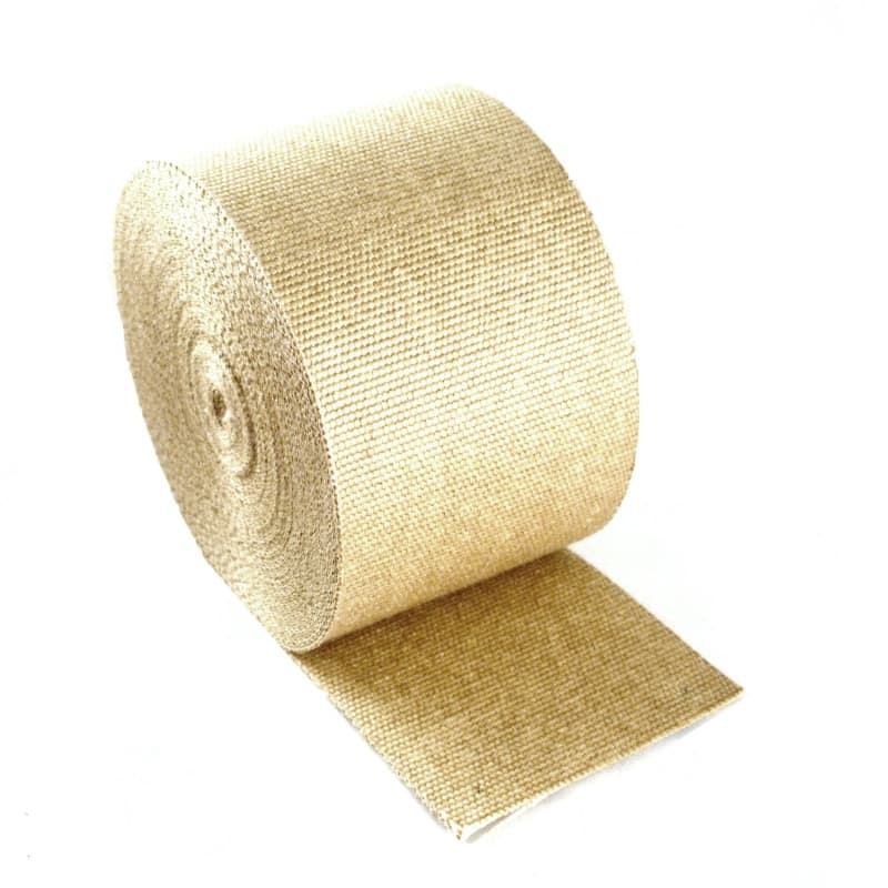 Tan-colored exhaust heat wrap roll, measuring 6 inches wide and 100 feet long, made of woven material designed to insulate and protect exhaust components.