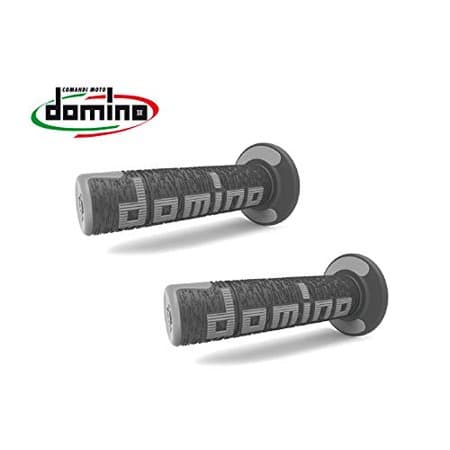 Ergonomic off-road grips in black and grey with textured surfaces and the "Domino" logo, designed for comfort and control.