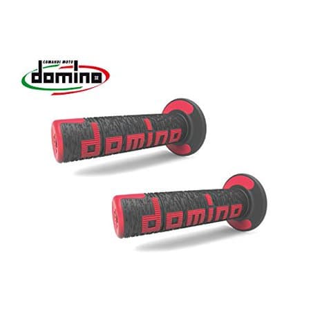 Black and red ergonomic off-road comfort grips featuring a textured surface and the "Domino" logo prominently displayed in red on the side.