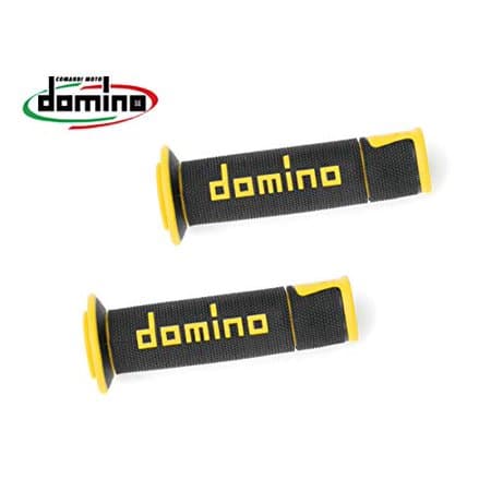 Black rubber offroad grips with yellow accents and "domino" branding, featuring a textured surface for enhanced grip and control.