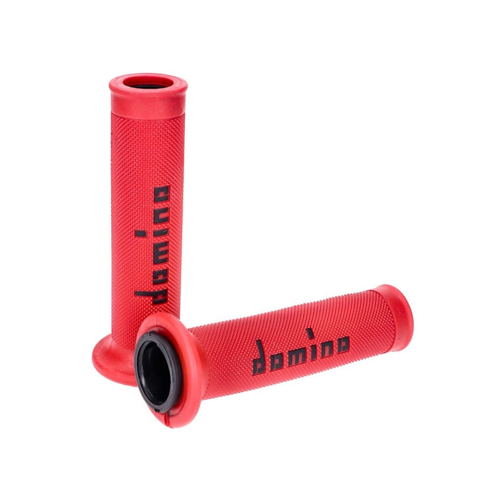 Red and black rubber motorcycle grips with a textured surface and open ends, featuring the "Domino" logo prominently displayed.