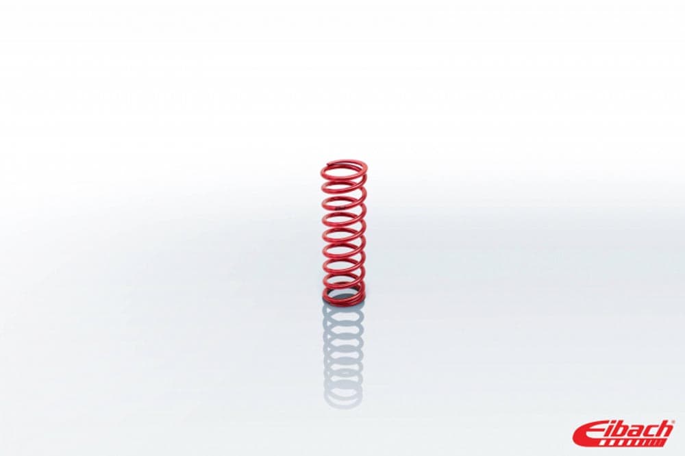 Red coilover spring with a 2.250-inch inner diameter and a 600 lbs/in rate, featuring tightly wound coils and a glossy finish, branded with Eibach logo.