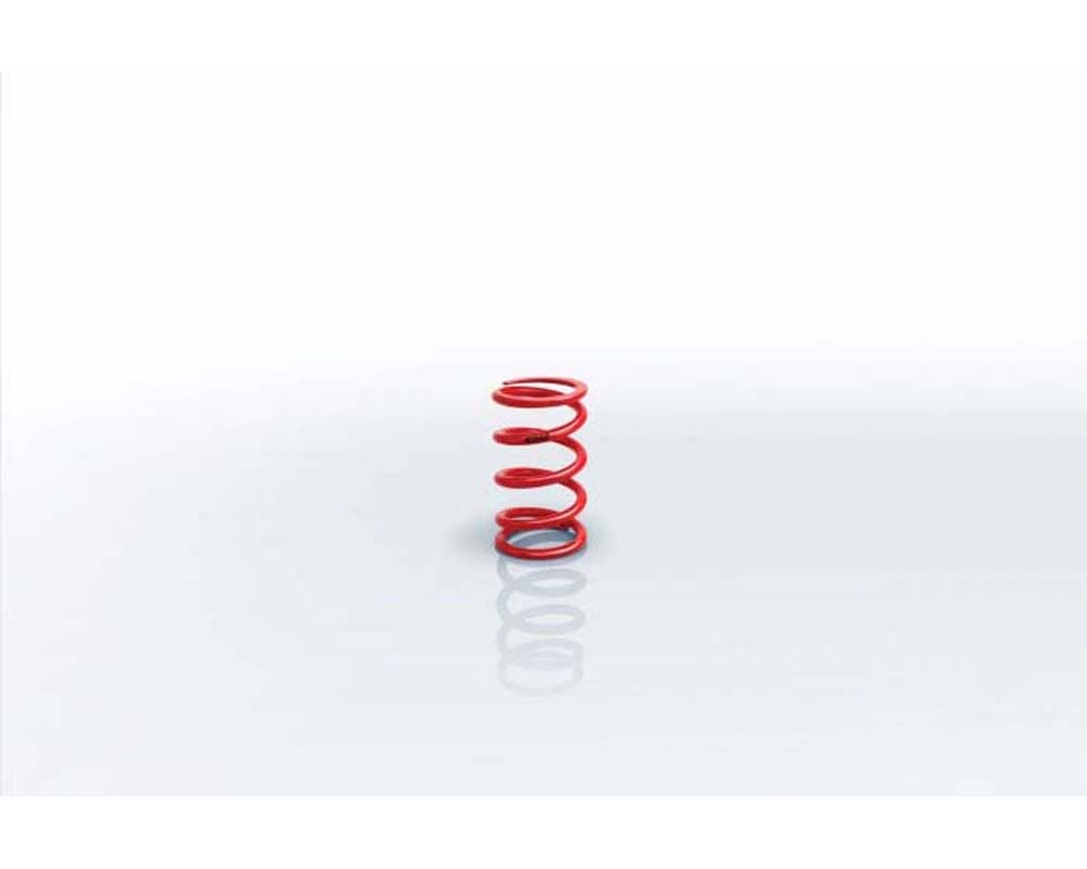 Red coilover spring with a smooth finish and tightly wound coils, designed for enhanced vehicle suspension performance.