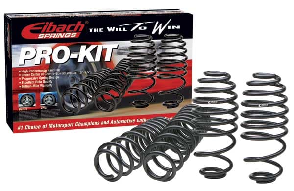 Black coil springs arranged in a stack, with a red and black box in the background labeled "Eibach Pro-Kit" featuring performance details for 2017-2018 Tesla 3 Long Range RWD.