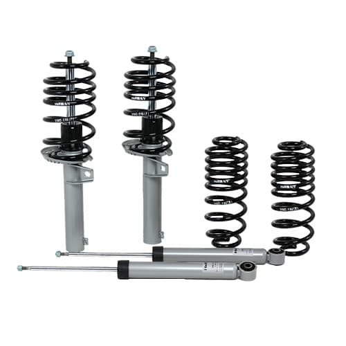 H&R 41877-1 Suspension Kit featuring two black coil springs and two silver shock absorbers, designed for enhanced comfort in vehicle suspension systems.