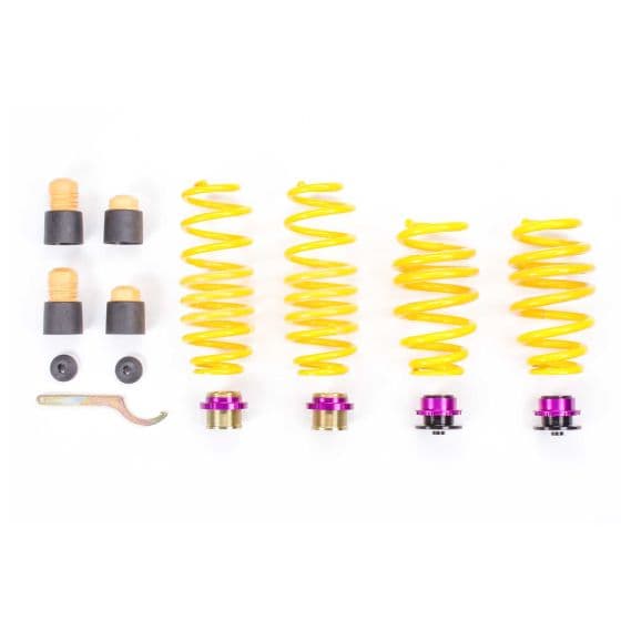 KW Suspension Height-Adjustable Lowering Spring Kit featuring vibrant yellow coil springs, purple adjustment collars, and black rubber bump stops for customizable vehicle lowering.