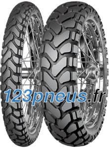 Mitas Enduro Trail + rear motorcycle tire features a rugged tread pattern for off-road performance, with a 140/80B18 size and M+S marking, showcasing a black rubber material and metal spokes.