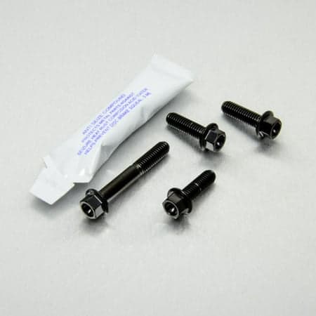 Pro-Bolt Stainless Steel Brake & Clutch Lever Perch Pinch Bolt Kit in black, featuring four black bolts and a small tube of adhesive, designed for durability and performance.