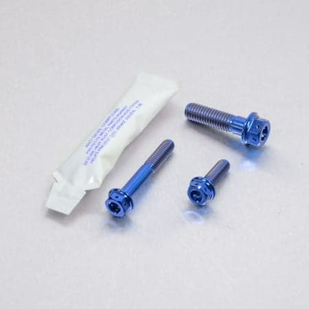 Pro-Bolt Titanium Chain Guard & Rail Bolt Kit in blue, featuring three blue titanium bolts and a small packet of thread locker, all set against a silver background.