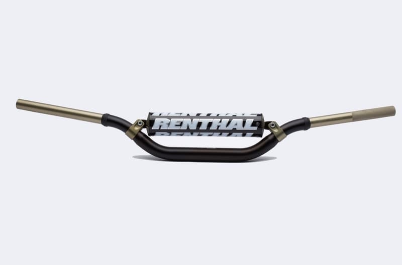 Black Renthal 996 Twinwall handlebars with a distinctive Villopoto/Stewart bend, featuring gold-colored ends and a prominent Renthal logo on the crossbar.