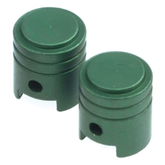 Green alloy valve caps with a piston shape, featuring a smooth top and a small hole, designed for durability and style.