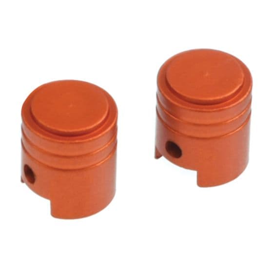 Two orange alloy valve caps with a piston shape, featuring a smooth finish and a small hole on the side for easy installation.