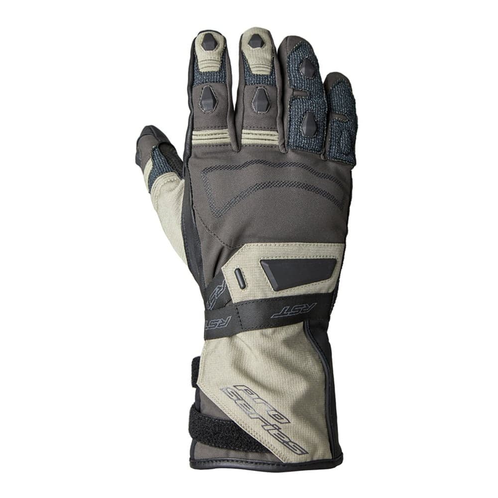 Beige, brown, and black waterproof gloves with textured grip, reinforced knuckles, and adjustable wrist strap, size M, designed for outdoor activities by RST.