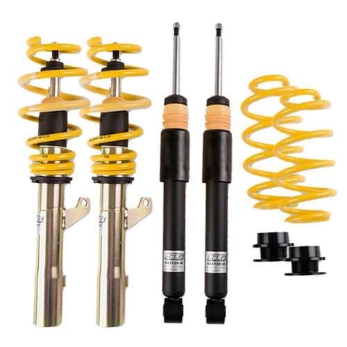 ST Suspension ST X Coilover Kit featuring yellow coil springs, black shock absorbers, and metallic components, designed to lower vehicle height by 30-55mm in the front and 30-60mm in the rear.