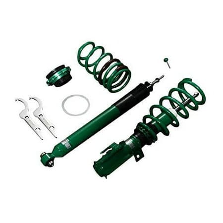 Tein GSQ74-91AS2 features green coil springs, a black shock absorber, and metal components, designed for adjustable suspension performance in vehicles.