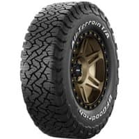 BF Goodrich All-Terrain T/A KO3 tire with rugged tread pattern, raised white lettering, and bronze alloy wheel.