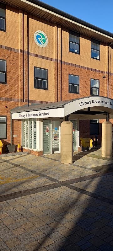 Library and Customer Services entrance with a brick building and the Redcar & Cleveland Borough Council logo visible.