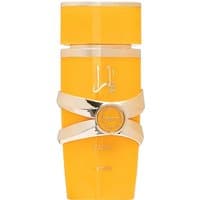 Yellow Lattafa Yara Tous Eau de Parfum bottle, 100 ml, with silver accents and Arabic script on the front.